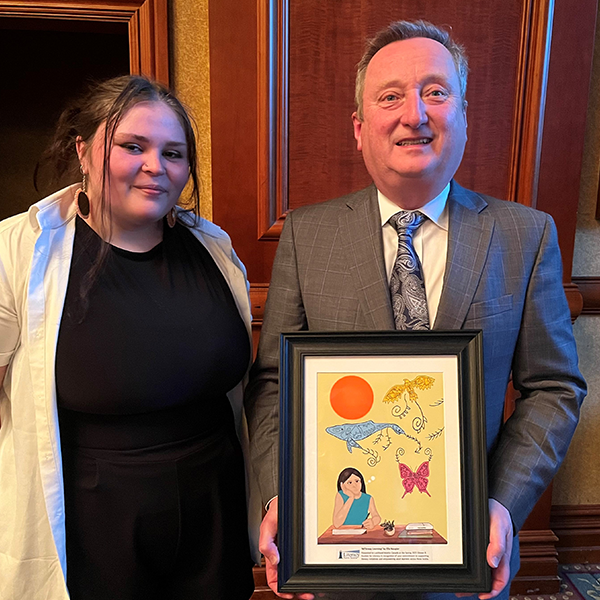 Glenn Copeland to the right of one of the adult learners